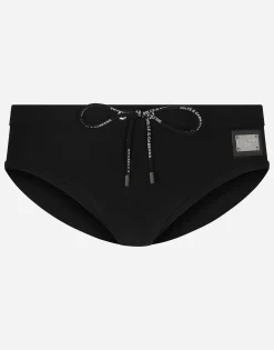 Swim briefs with high-cut leg and branded tag