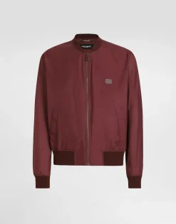 Technical fabric bomber jacket with tag