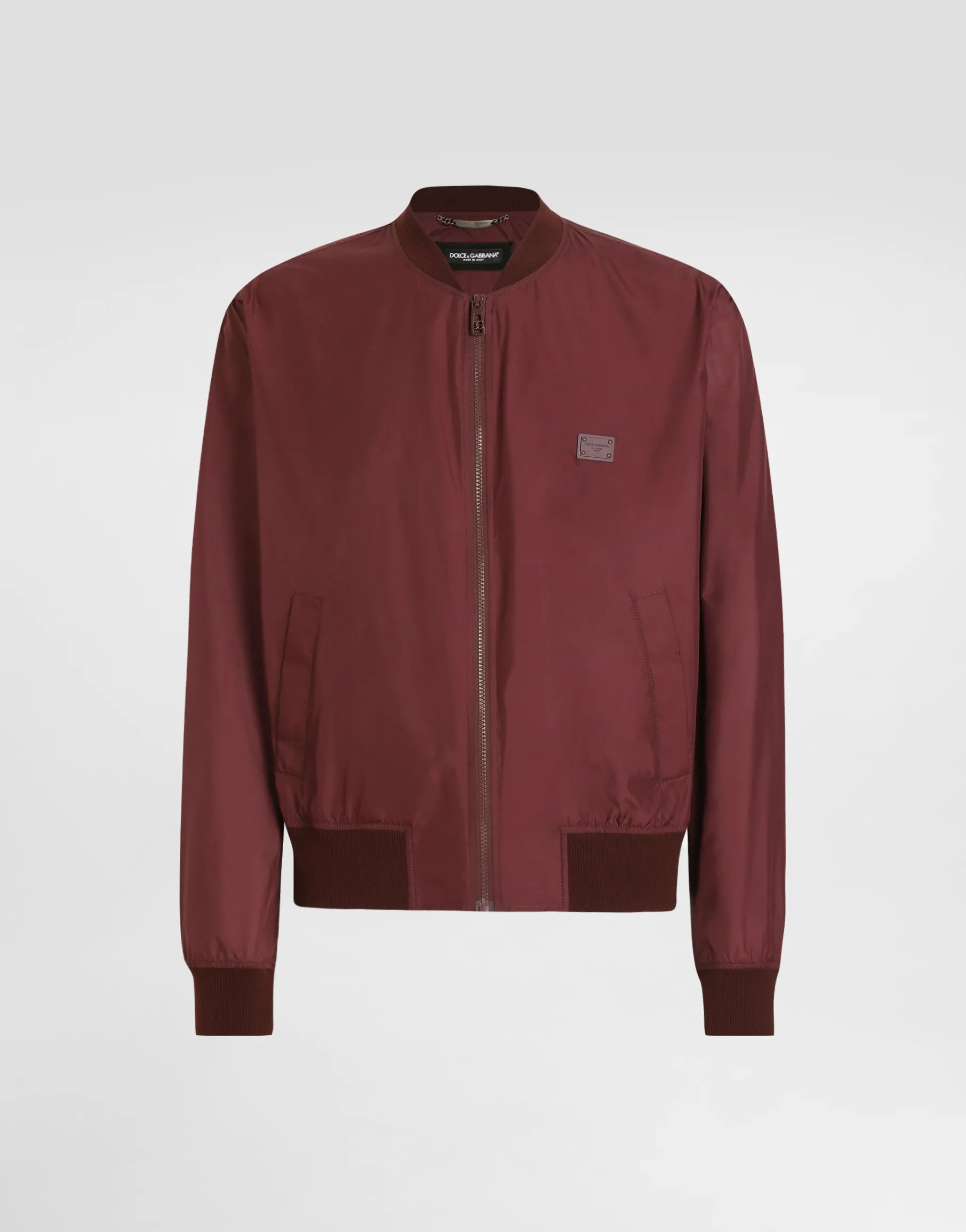Technical fabric bomber jacket with tag