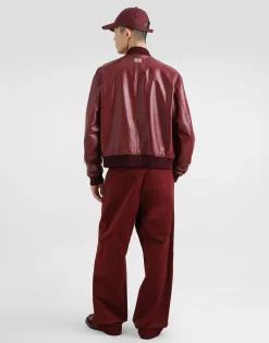 Technical fabric bomber jacket with tag