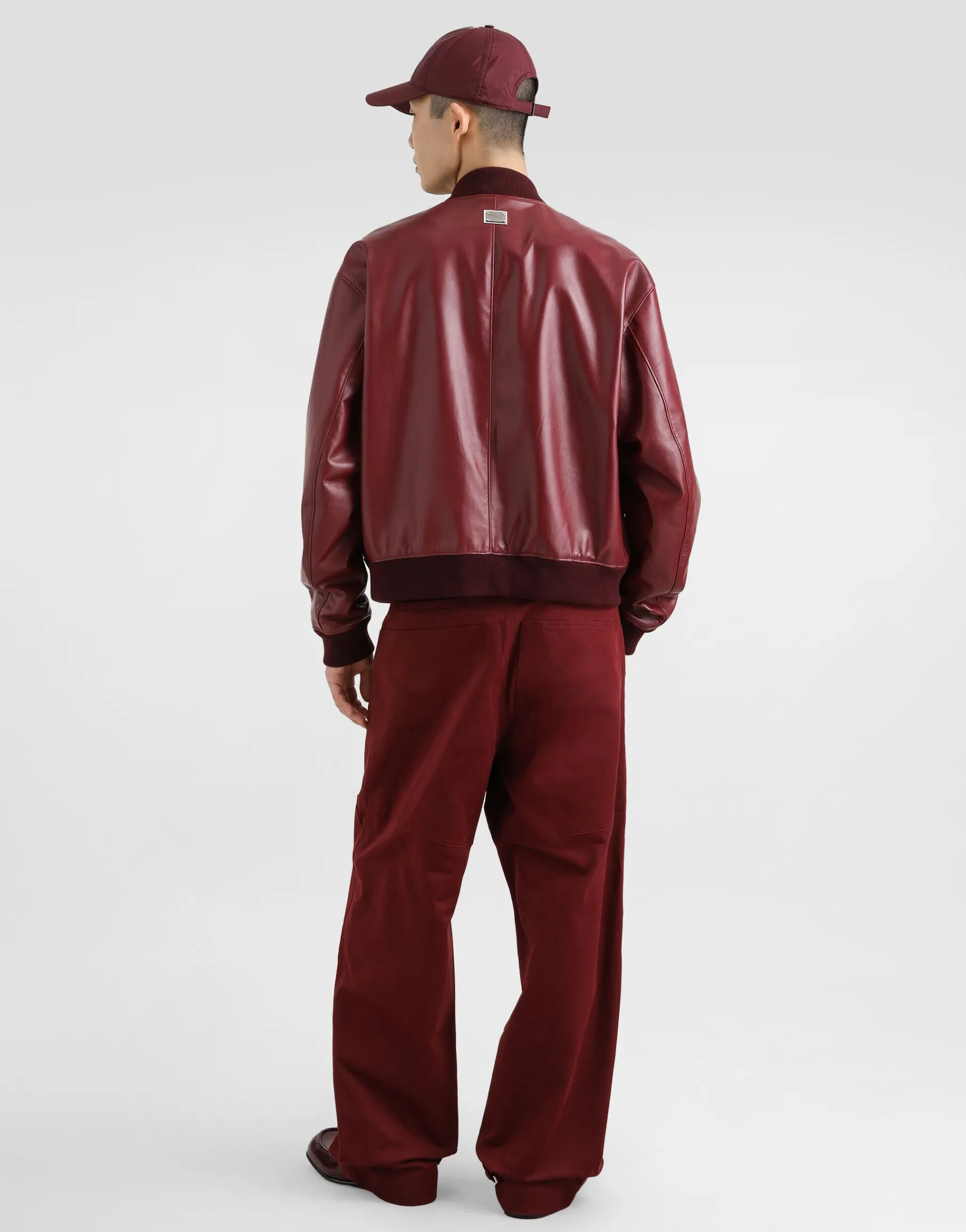 Technical fabric bomber jacket with tag