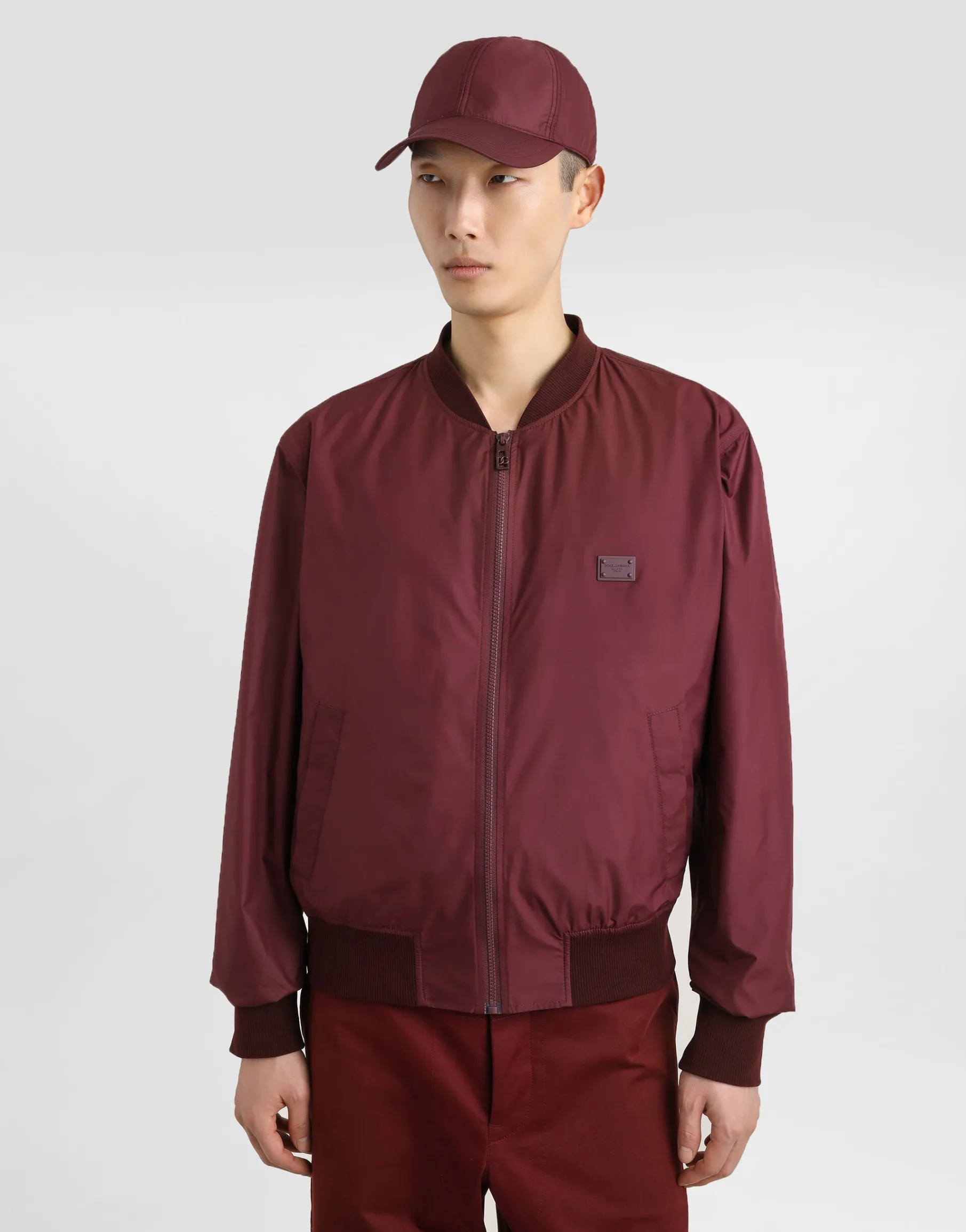 Technical fabric bomber jacket with tag