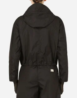 Technical fabric windbreaker with hood