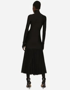 Technical jersey dress with tulle ruffle