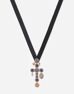Tradition cross pendant with tanzanites