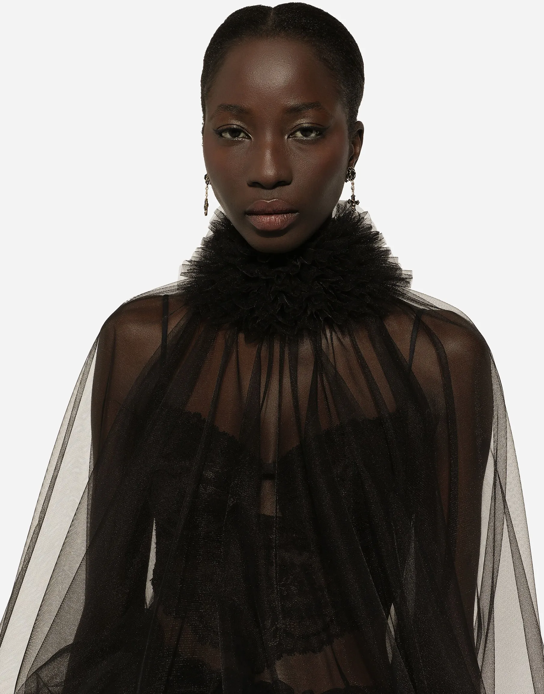 Tulle blouse with ruffles on the neck and cuffs