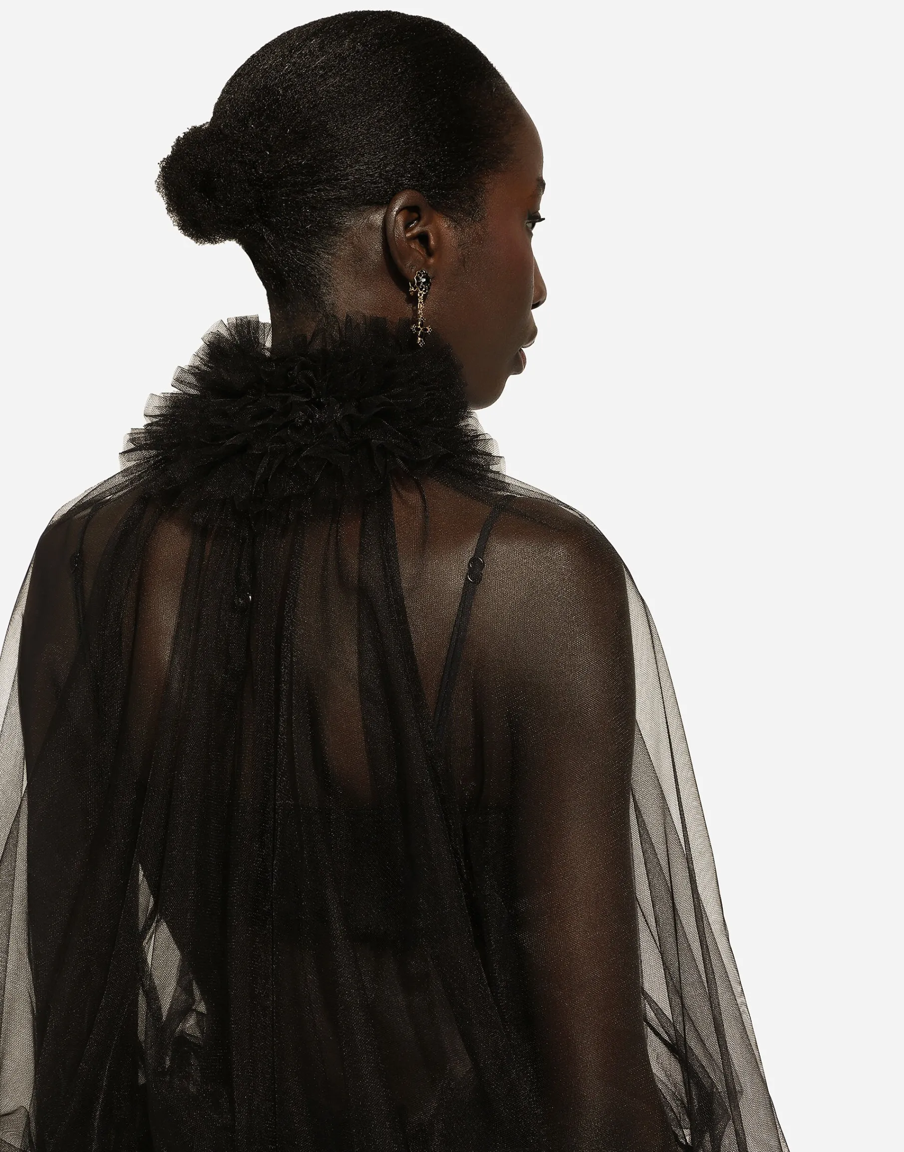 Tulle blouse with ruffles on the neck and cuffs