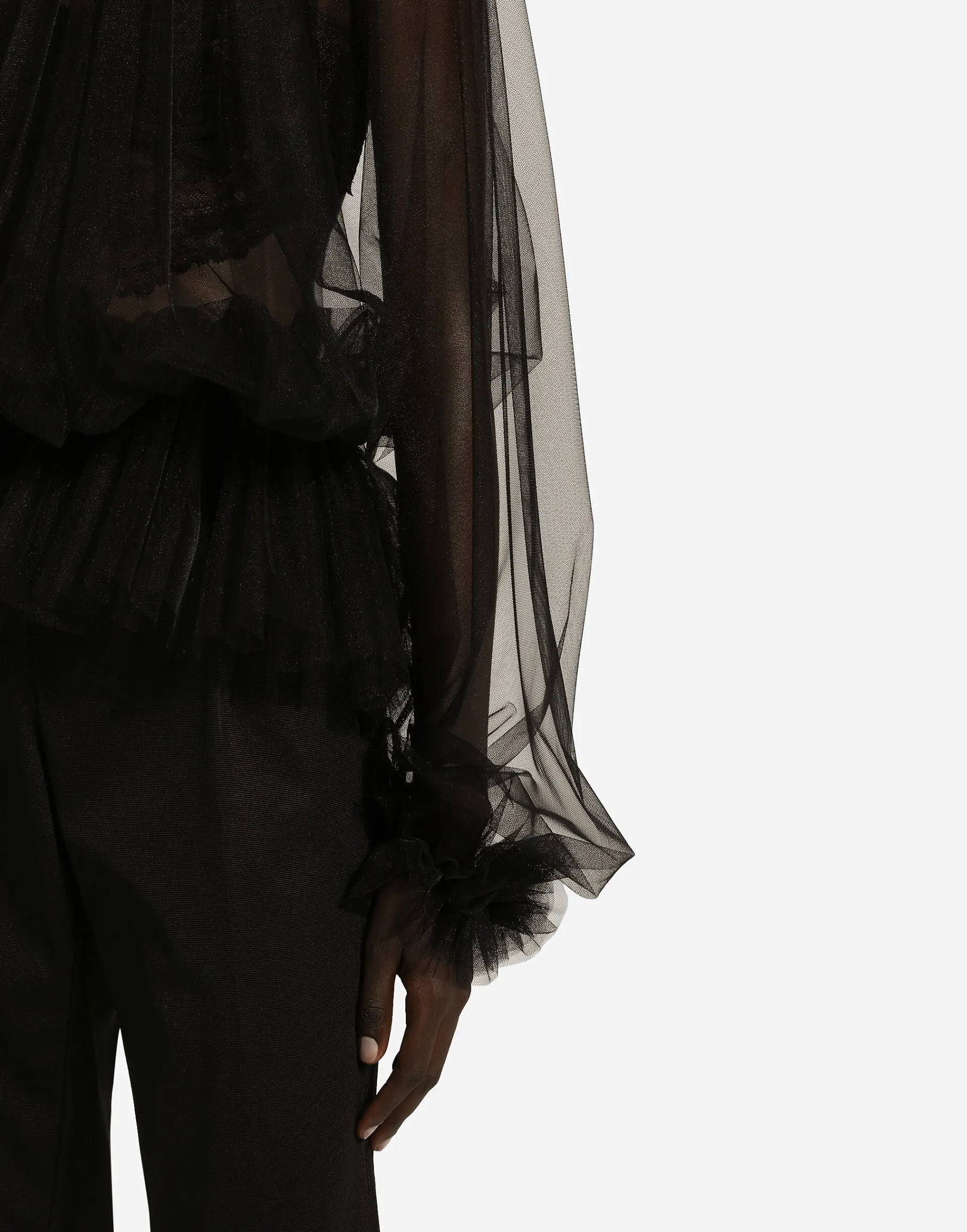 Tulle blouse with ruffles on the neck and cuffs