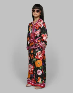 Twill shirt with floral print over a black background