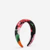 Viyella hairband with floral print over a black background
