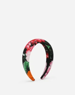 Viyella hairband with floral print over a black background