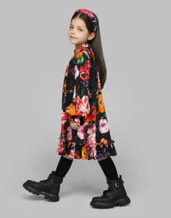 Viyella hairband with floral print over a black background