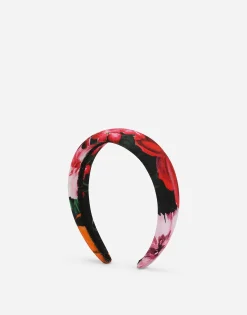 Viyella hairband with floral print over a black background