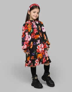Viyella hairband with floral print over a black background