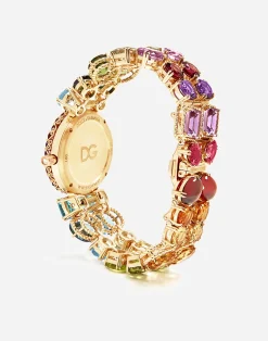 Watch with multi-colored gems