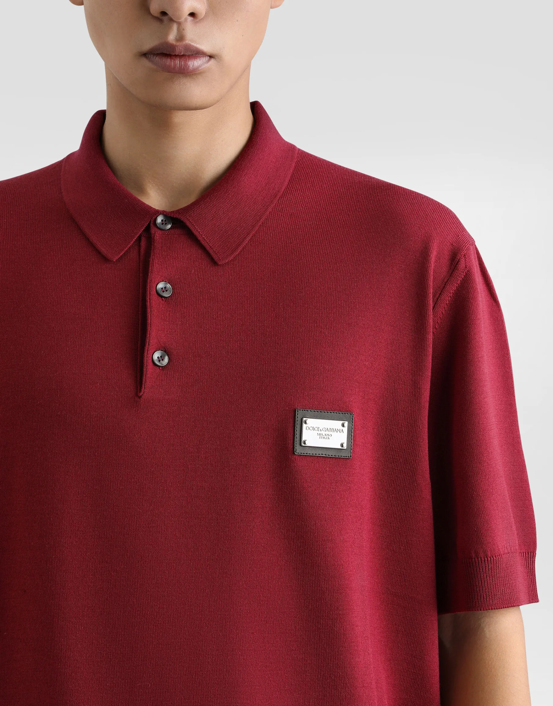Wool polo-shirt with branded tag