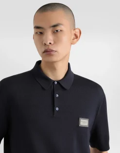 Wool polo-shirt with branded tag