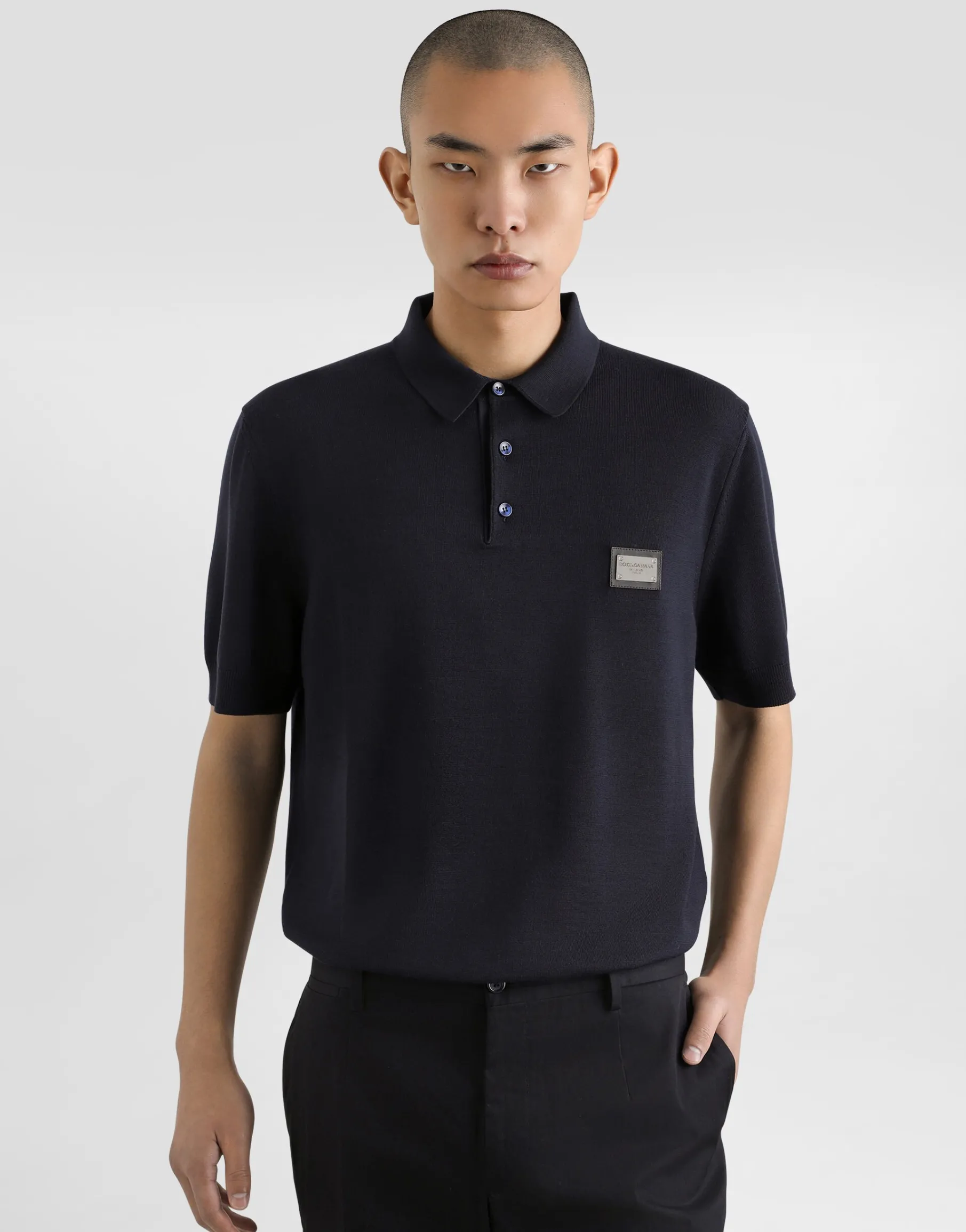 Wool polo-shirt with branded tag
