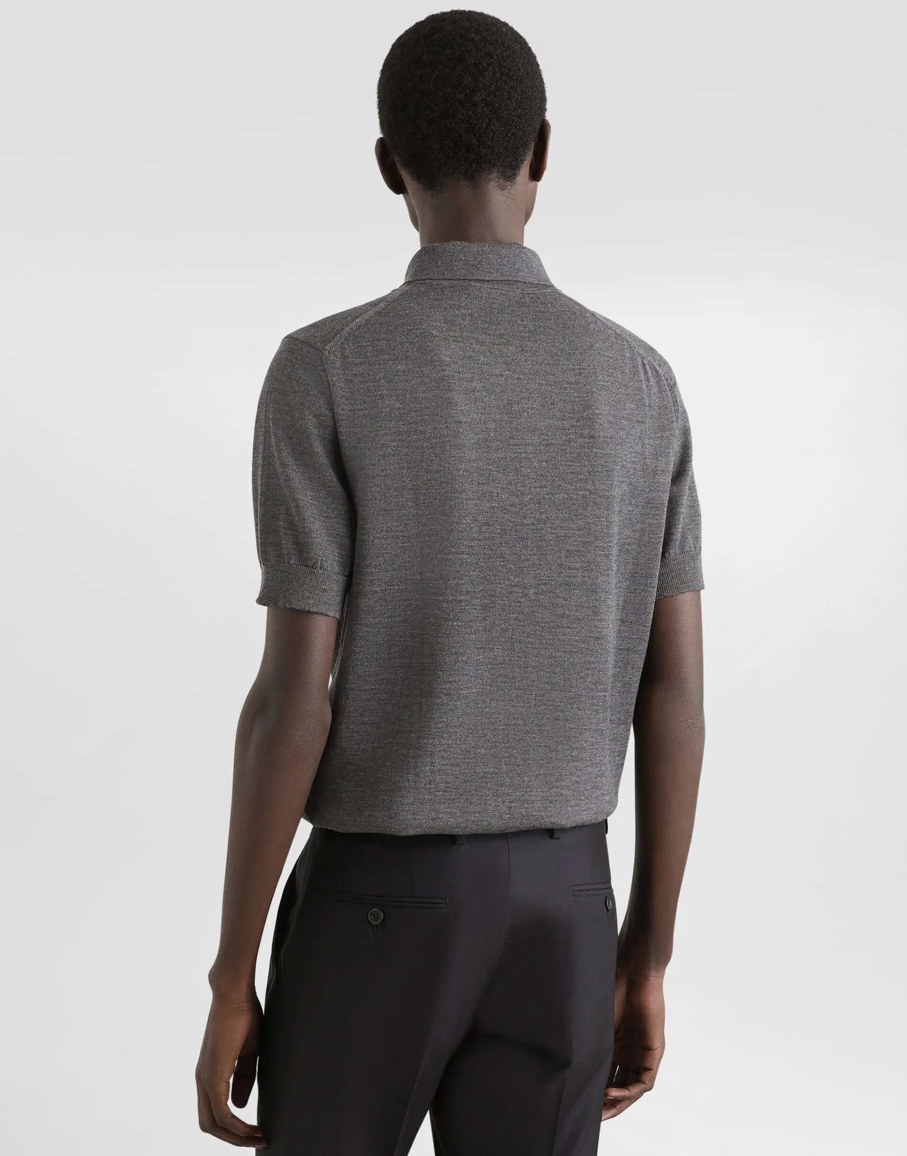 Wool polo-shirt with branded tag