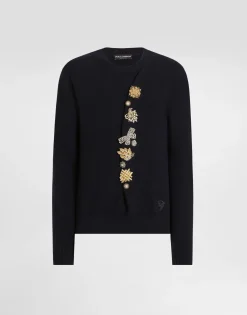 Wool round-neck sweater with bejeweled buttons