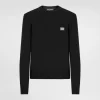 Wool round-neck sweater with branded tag