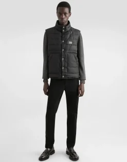 Wool round-neck sweater with branded tag