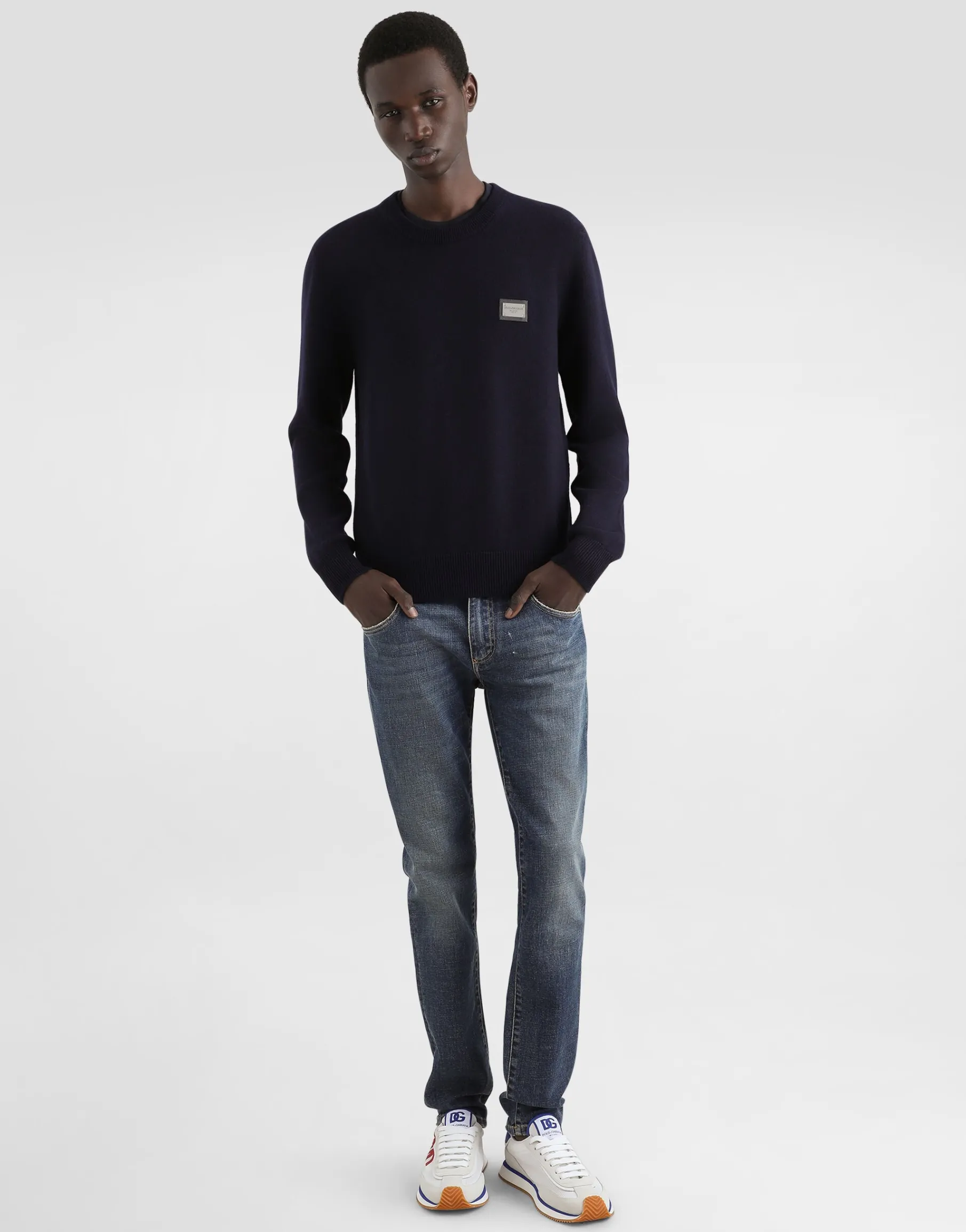 Wool round-neck sweater with branded tag