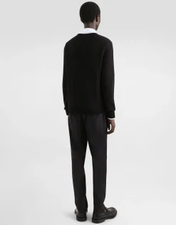 Wool round-neck sweater with branded tag