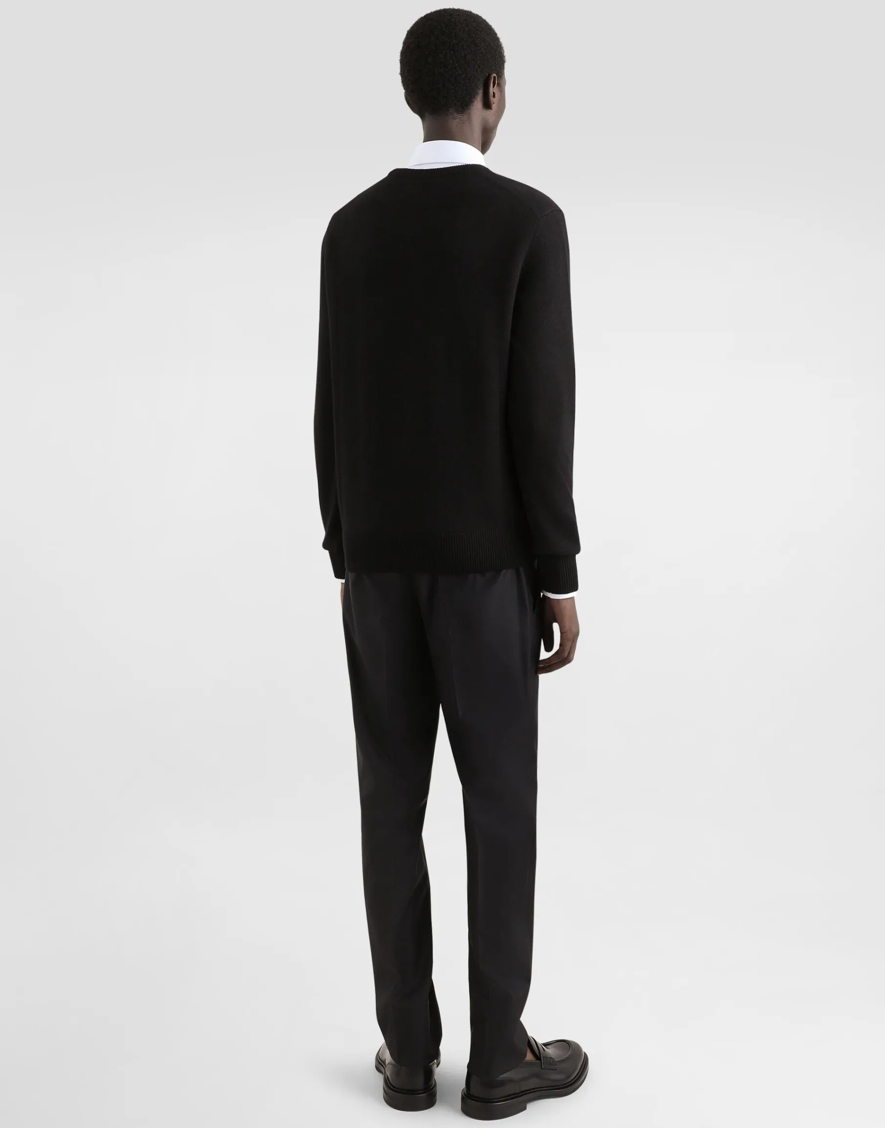 Wool round-neck sweater with branded tag