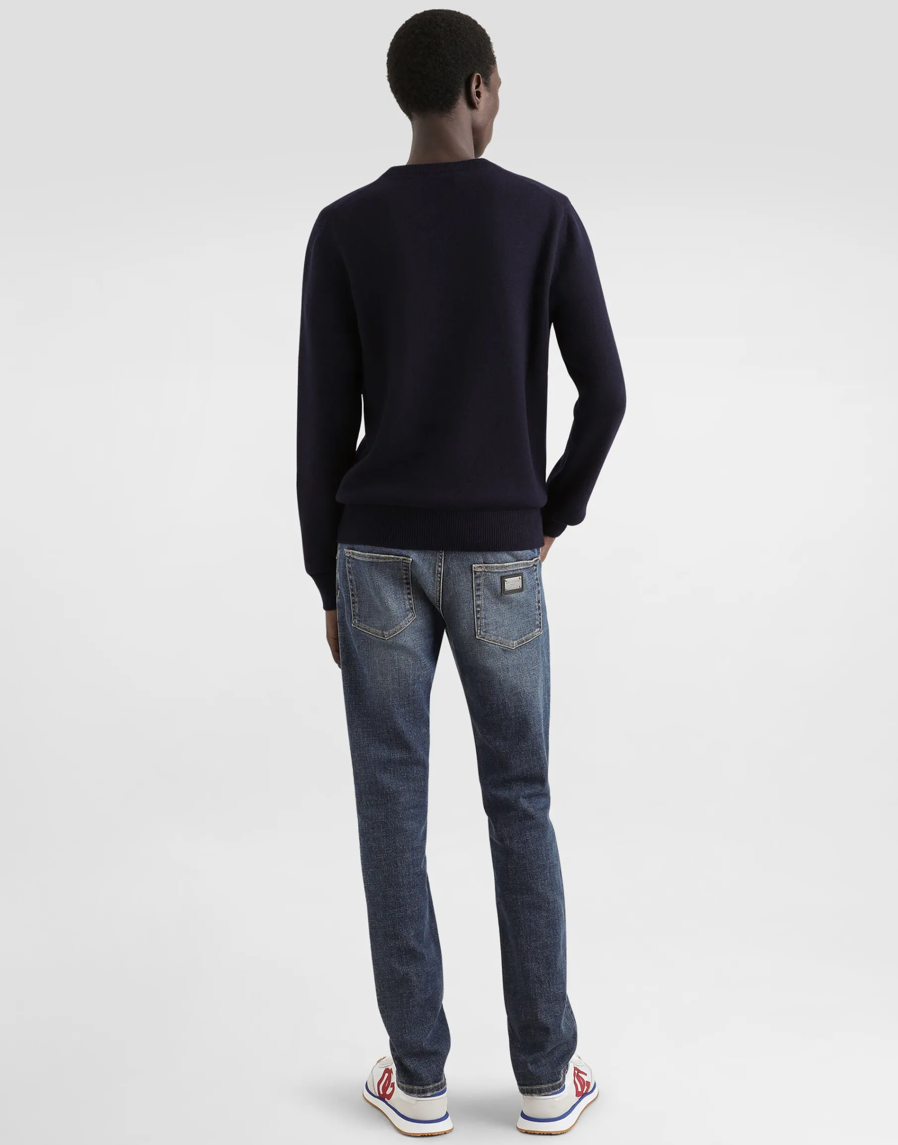 Wool round-neck sweater with branded tag
