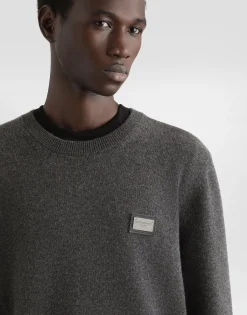 Wool round-neck sweater with branded tag