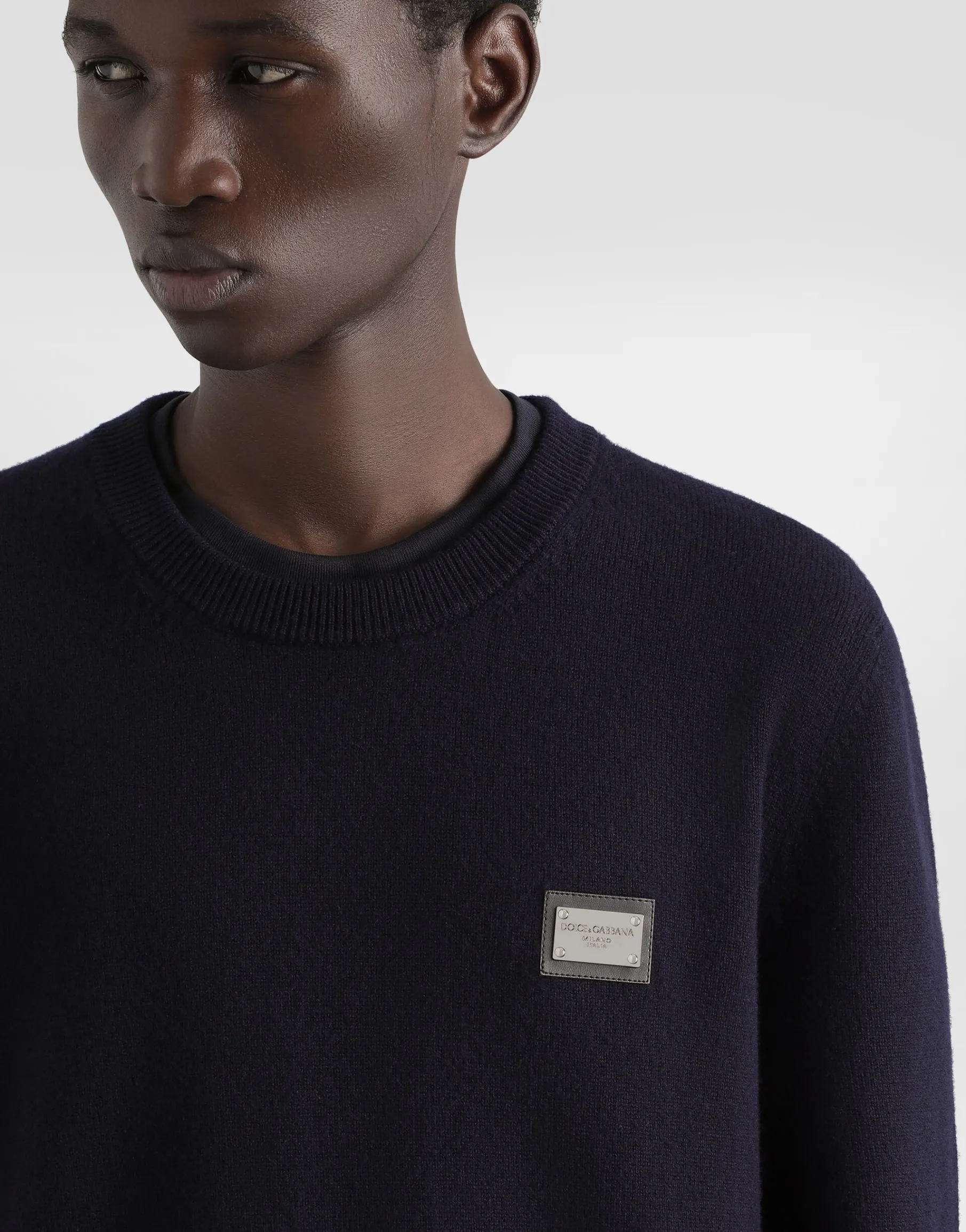Wool round-neck sweater with branded tag