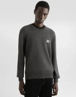 Wool round-neck sweater with branded tag