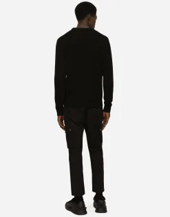 Wool round-neck sweater with branded tag