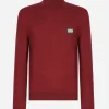 Wool turtle-neck sweater with branded tag
