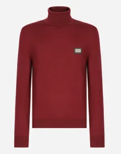 Wool turtle-neck sweater with branded tag