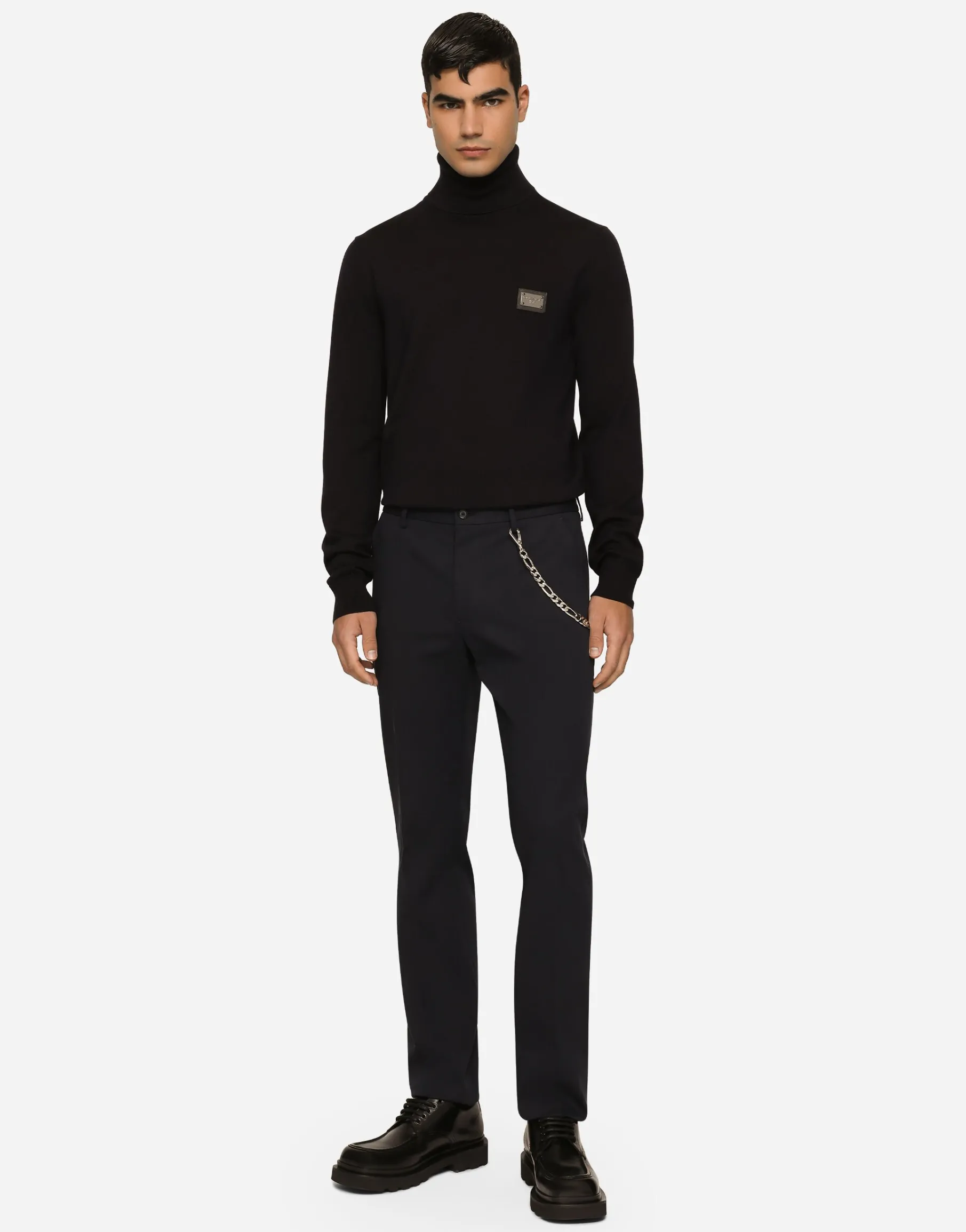 Wool turtle-neck sweater with branded tag