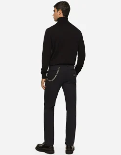 Wool turtle-neck sweater with branded tag