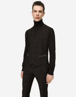 Wool turtle-neck sweater with branded tag