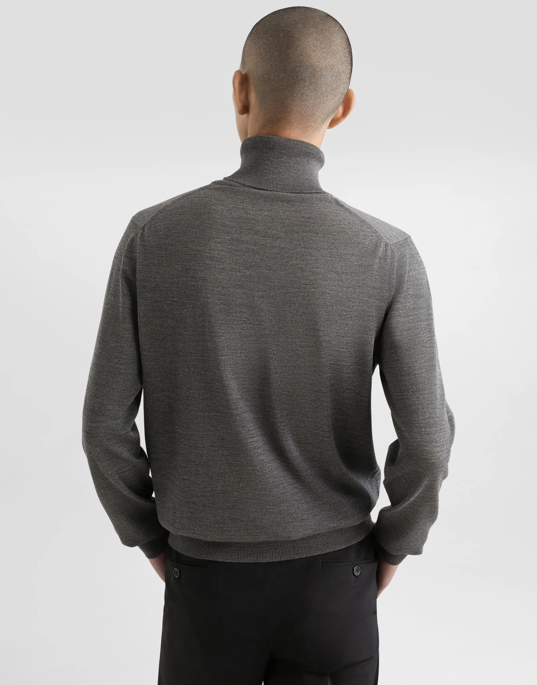 Wool turtle-neck sweater with branded tag