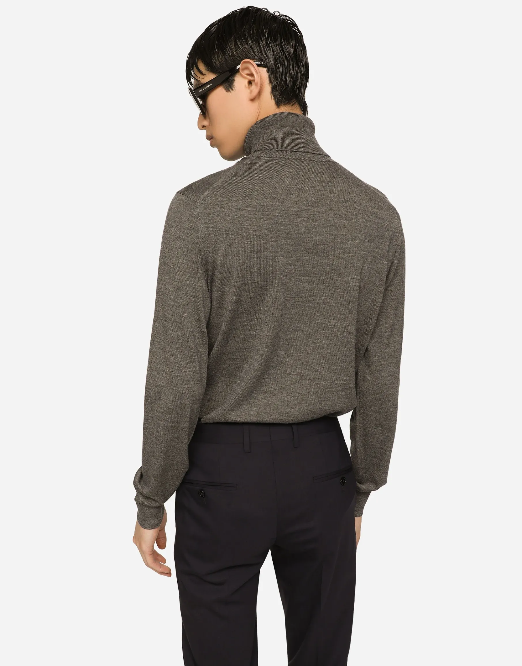 Wool turtle-neck sweater with branded tag