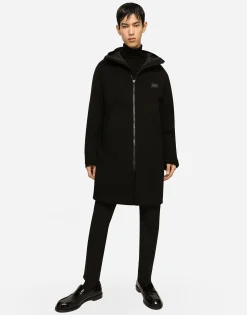 Wool turtle-neck sweater with branded tag